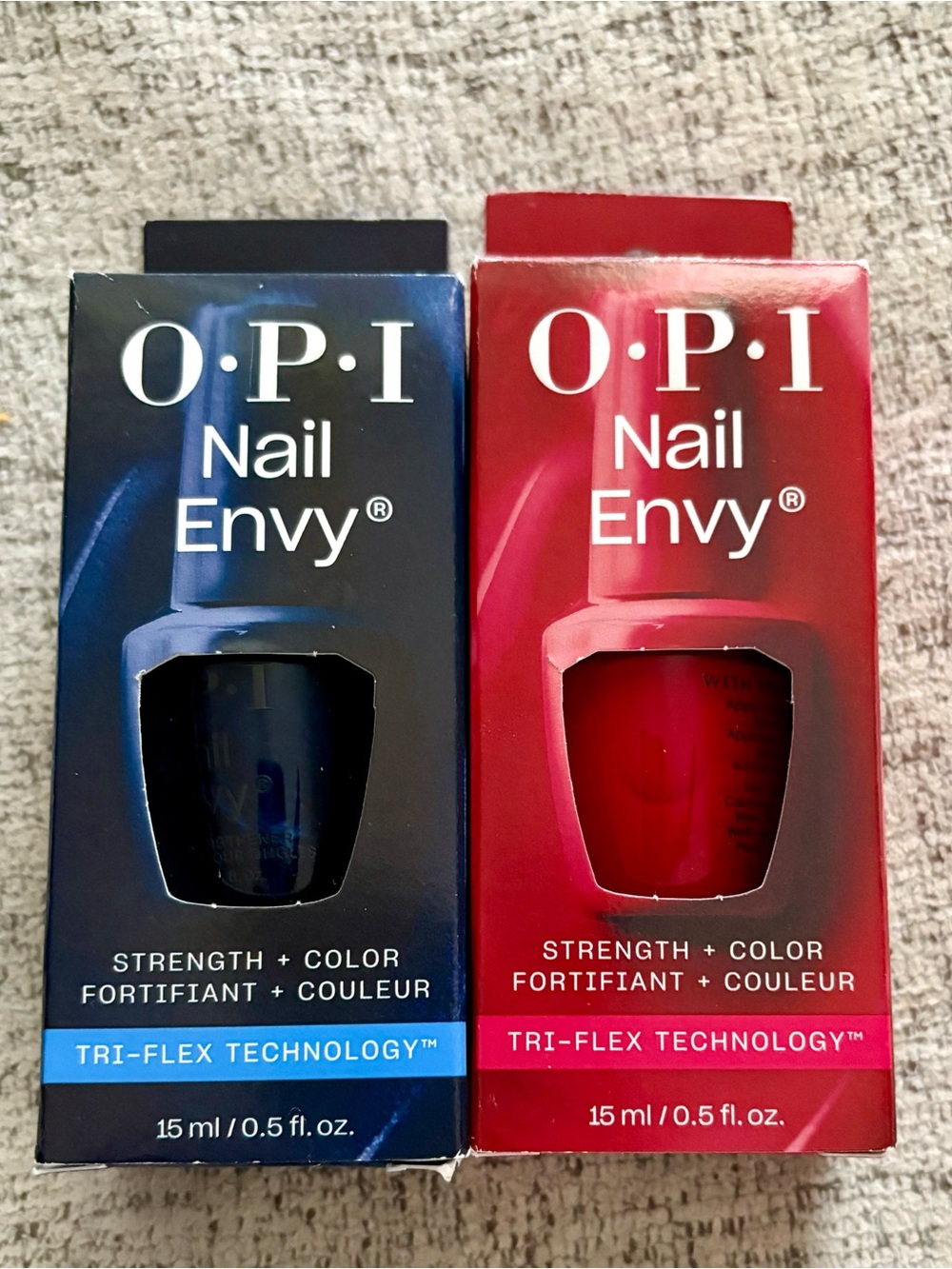 2 OPI NAIL ENVY Big Apple Red. All Night Strong Blue.  New in box!!